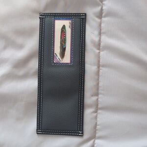 Handmade and painted feather by Rolando, artisan from Costa Rica. Pura Vida.